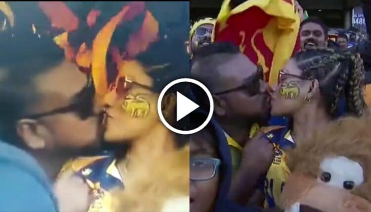 Couple kissing each other during Srilanka nederland match